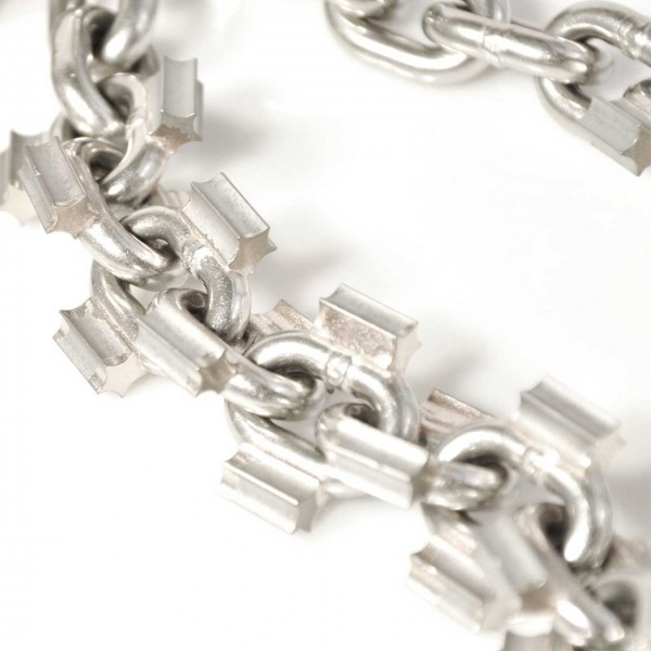 Chain with carbide spikes for chain knockers